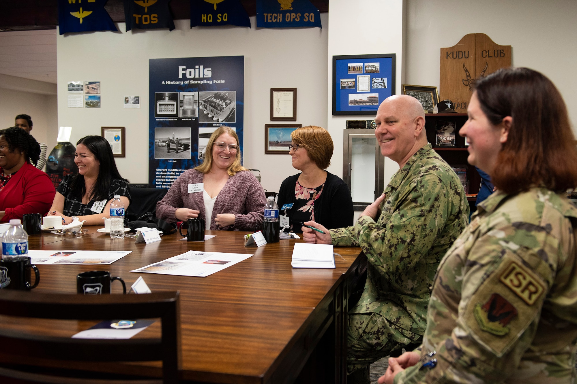 Admiral Christopher W. Grady (center right), Vice Chairman of the Joint Chiefs of Staff, shares a laugh with spouses from the Air Force Technical Applications Center, Patrick Space Force Base, Fla.  The admiral and his wife, Christine, visited the Department of Defense’s sole nuclear treaty monitoring center June 9, 2023 to meet with the men and women of AFTAC who perform and support the 24/7 no-fail mission.  (U.S. Air Force photo by Matthew S. Jurgens)