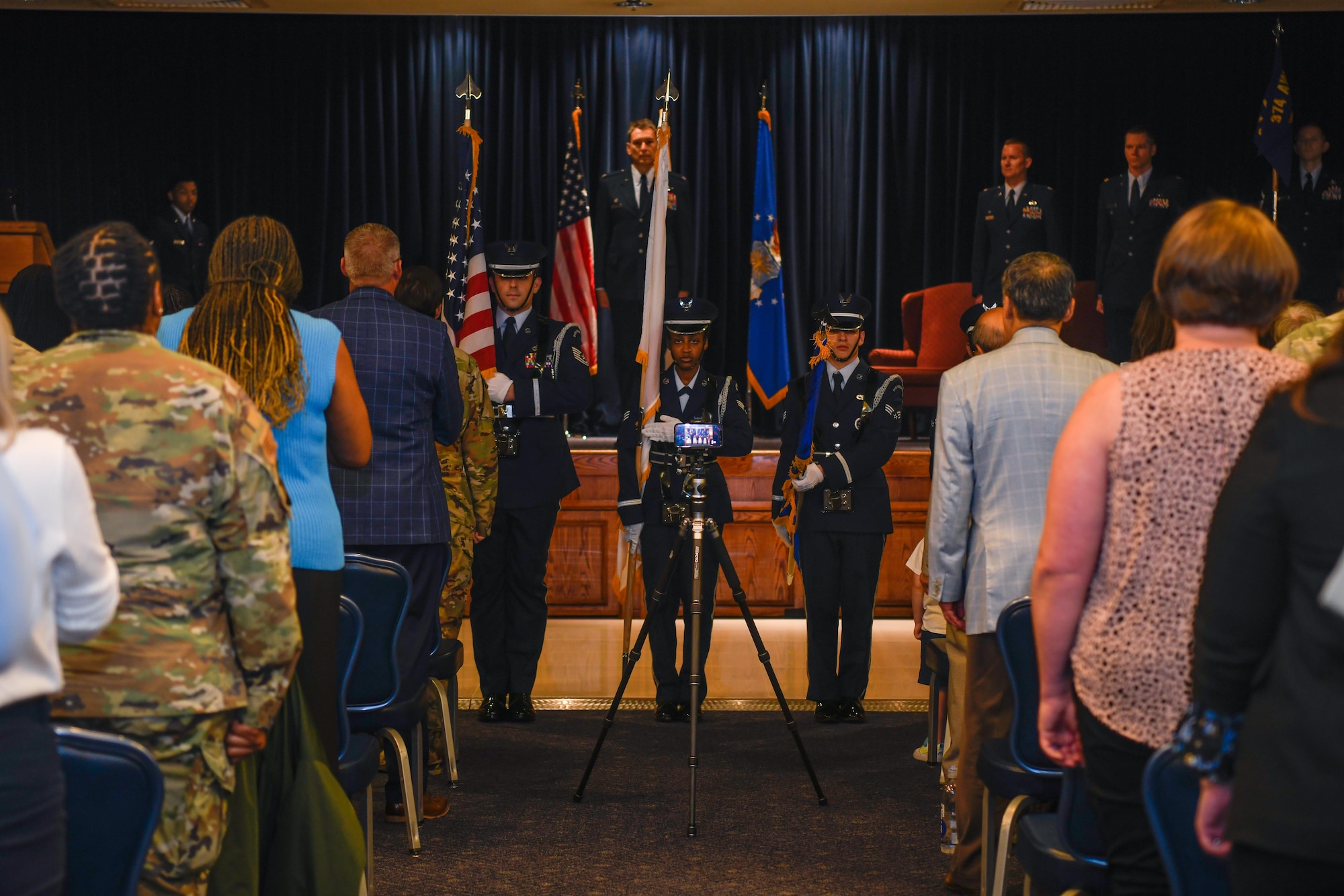 The Yokota Base Honor Guard present the colors.