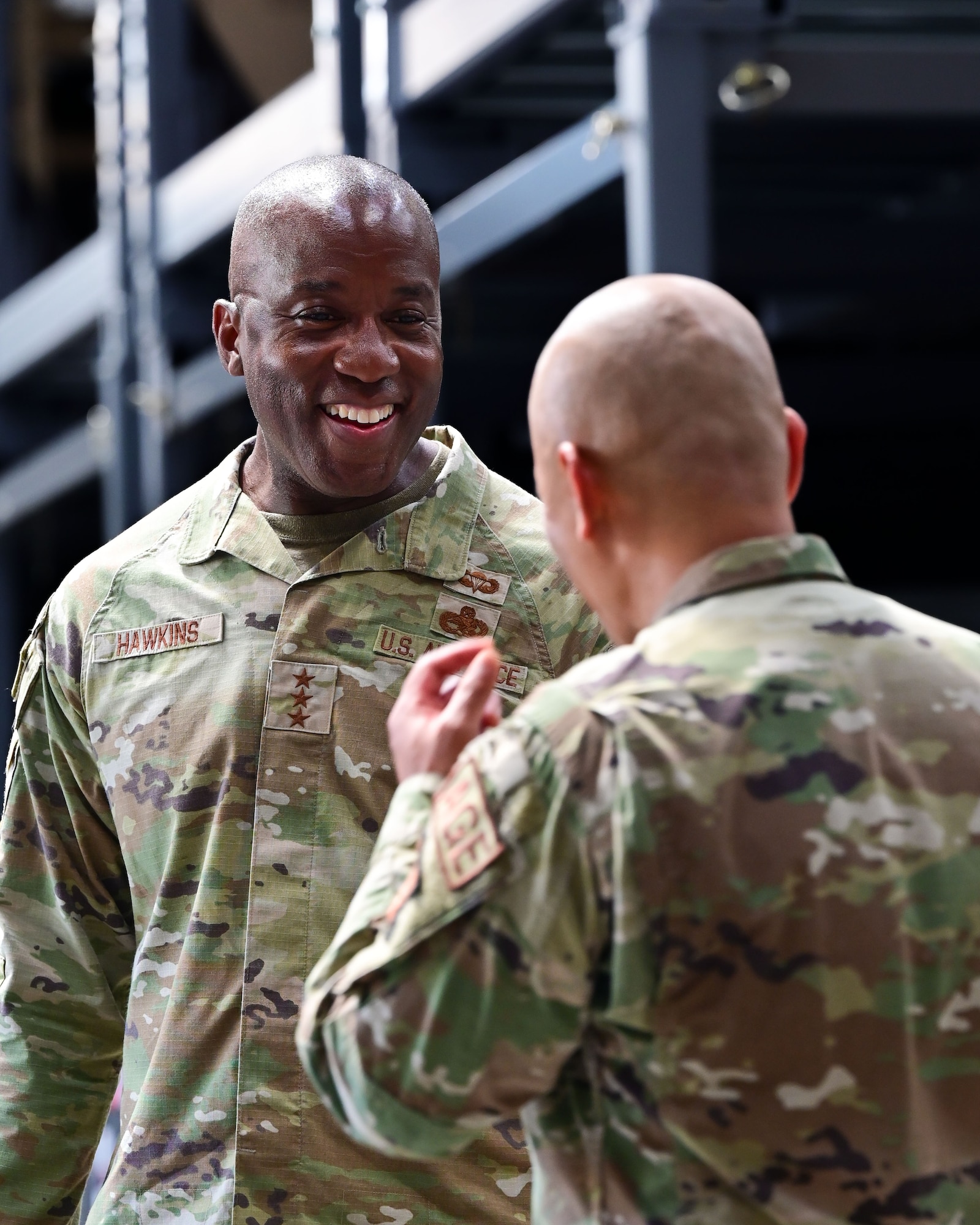 U.S. Air Force Lt. Gen. Stacey T. Hawkins, Air Force Sustainment Center commander, left, meets with the 86th Materiel Maintenance Squadron at Sanem, Luxembourg, June 8, 2023. Hawkins toured the 86th MMS’ facility to engage with the Airmen and local national professionals and gain a better understanding of their capabilities as the Air Force depot and supply chain management team. (U.S. Air Force photo by Senior Airman Andrew Bertain)