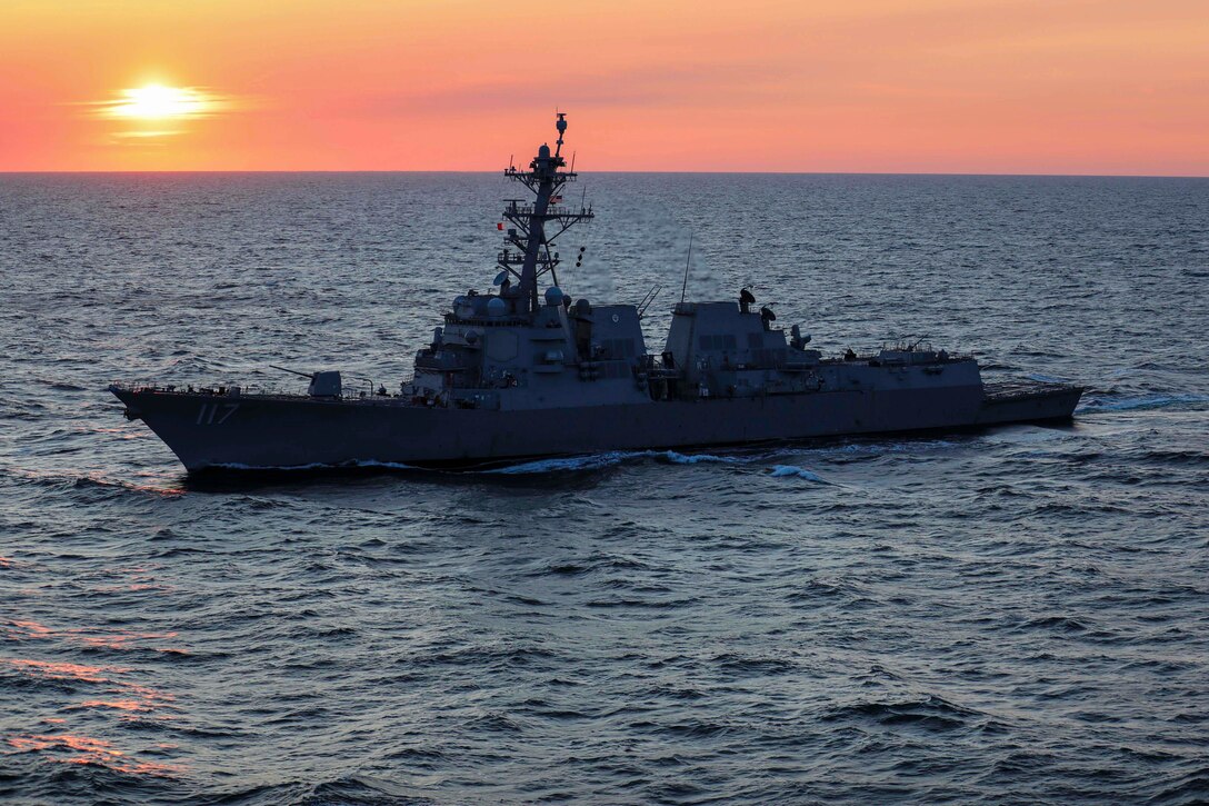 A ship sails the Baltic Sea at twilight.