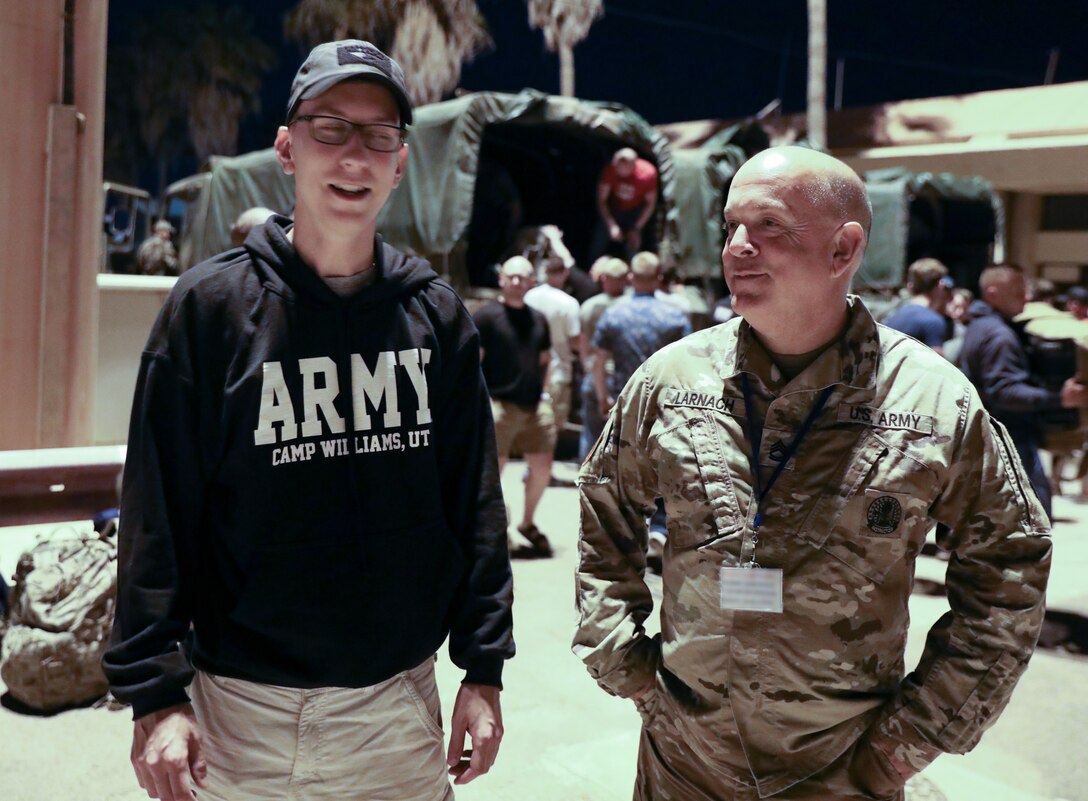 Father and son reunite on military overseas mission