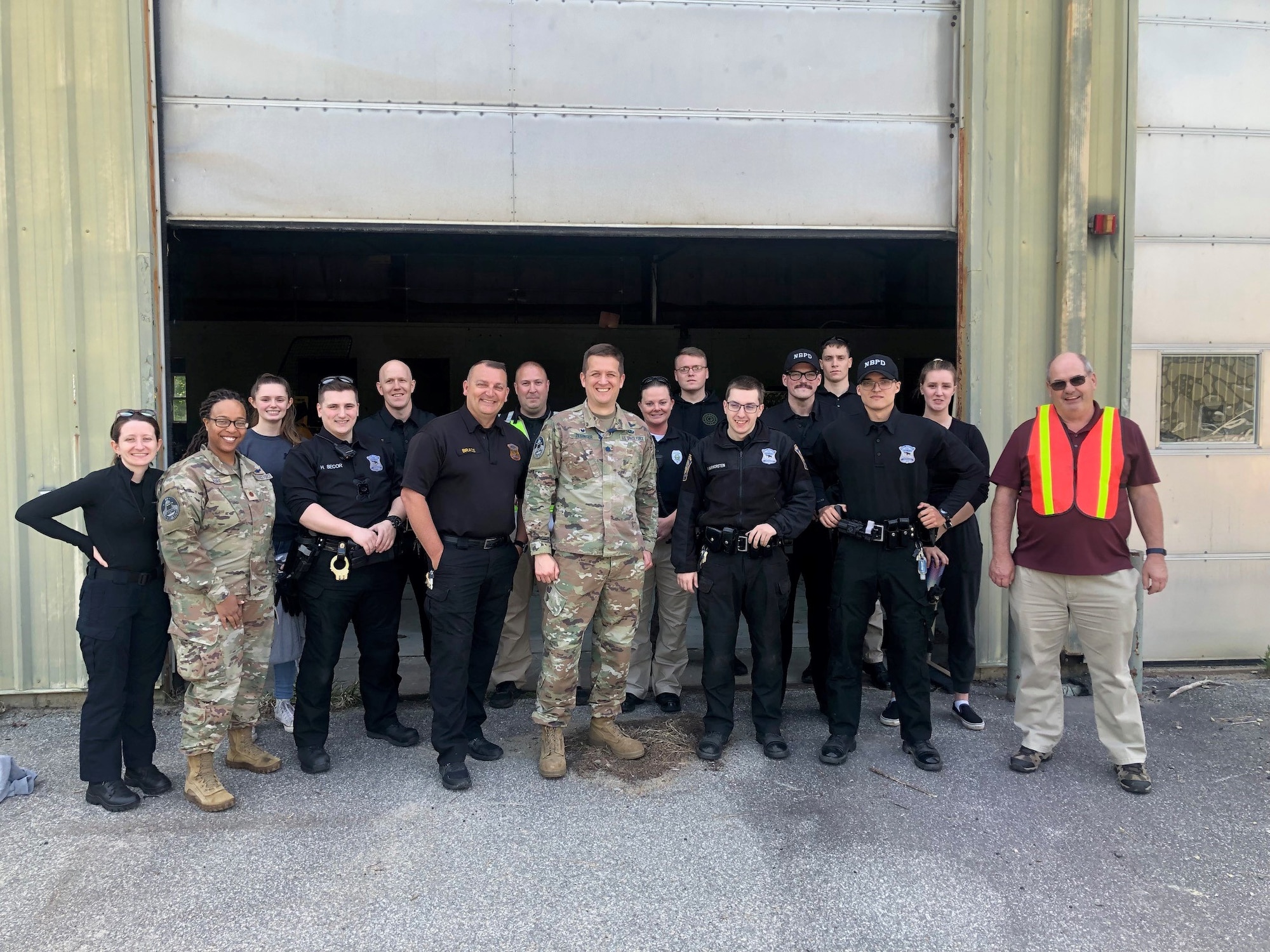 Members of the 23rd Space Operations Squadron and the New Boston Police Department pose for a group picture after an active-shooter training on New Boston SFS on May 23, 2023. The goal of this partnership was to provide realistic training with opportunities to learn in a controlled environment, resulting in increased safety for both the officers and the public. (Courtesy photo)