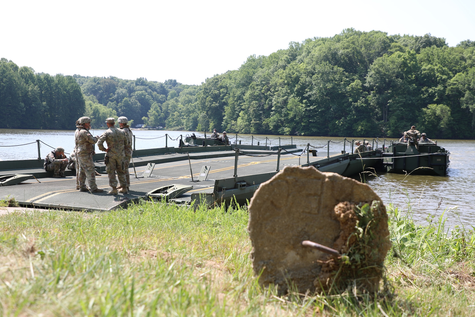 Soldiers with the Kentucky National Guard’s 2061st Multi-Role Bridge Company prepare to load their raft bridge during the Homeland Defender Exercise at the Muscatatuck Training Center in Butlerville, Ind., June 9, 2023.