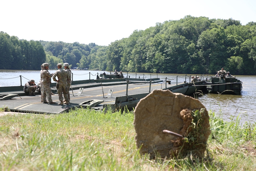 Soldiers with the Kentucky National Guard’s 2061st Multi-Role Bridge Company prepare to load their raft bridge during the Homeland Defender Exercise at the Muscatatuck Training Center in Butlerville, Ind., June 9, 2023.