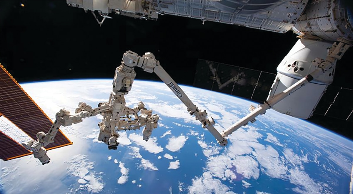Waters fig. 2: A photo showing the Canadarm2 and Dextre working on the International Space Station