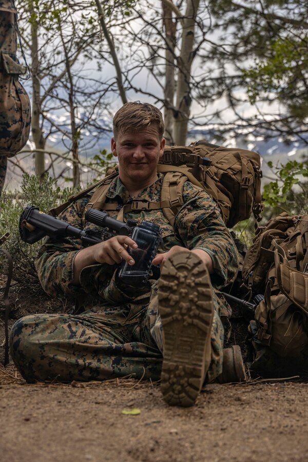 U.S. Marine Corps Lance Cpl. Markus Rosensyrrist, a team leader with Golf Company, 2nd Battalion, 23d Marine Regiment, 4th Marine Division, rests on a conditioning hike during Mountain Training Exercise 4-23 at Marine Corps Mountain Warfare Training Center in Bridgeport, California, June 13, 2023. Marines begin MTX by conducting conditioning hikes to acclimate to their environment in preparation for increasingly difficult training that will prepare them for the challenges of operating in a mountainous environment. Rosensyrrist is a native of Palo Alto, CA. (U.S Marine Corps photo by Lance Cpl. Samwel Tabancay)