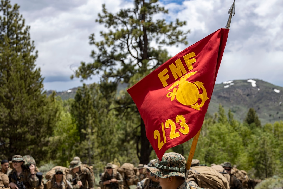 Marines with 2/23 conduct a conditioning hike during MTX 4-23