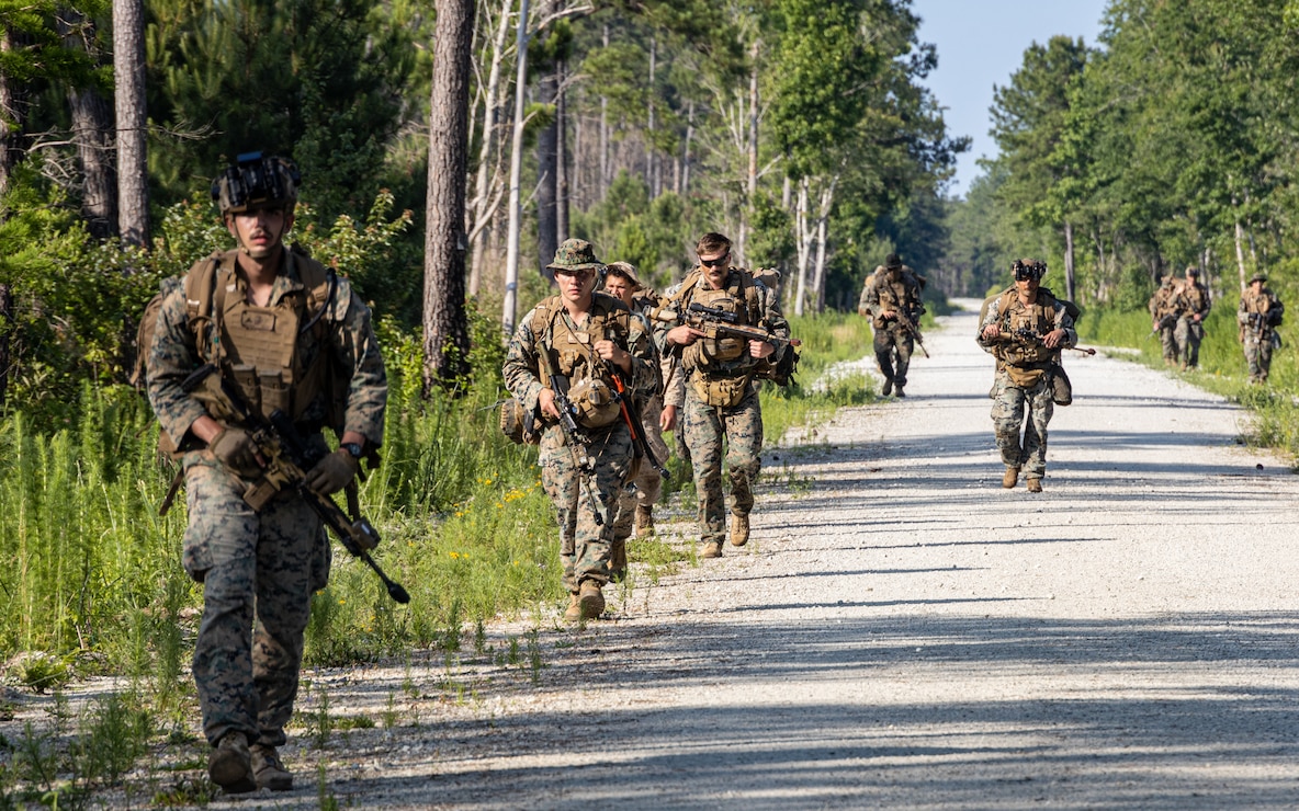 U.S. Marines with 2d Battalion, 2d Marine Regiment, 2d Marine Division conduct a tactical movement to contact during a Marine Corps Combat Readiness Evaluation (MCCRE) on Camp Lejeune, North Carolina, June 5, 2023. The MCCRE is designed to evaluate and certify a unit's comprehensive warfighting ability. (U.S. Marine Corps photo by Lance Cpl. Joshua Kumakaw)