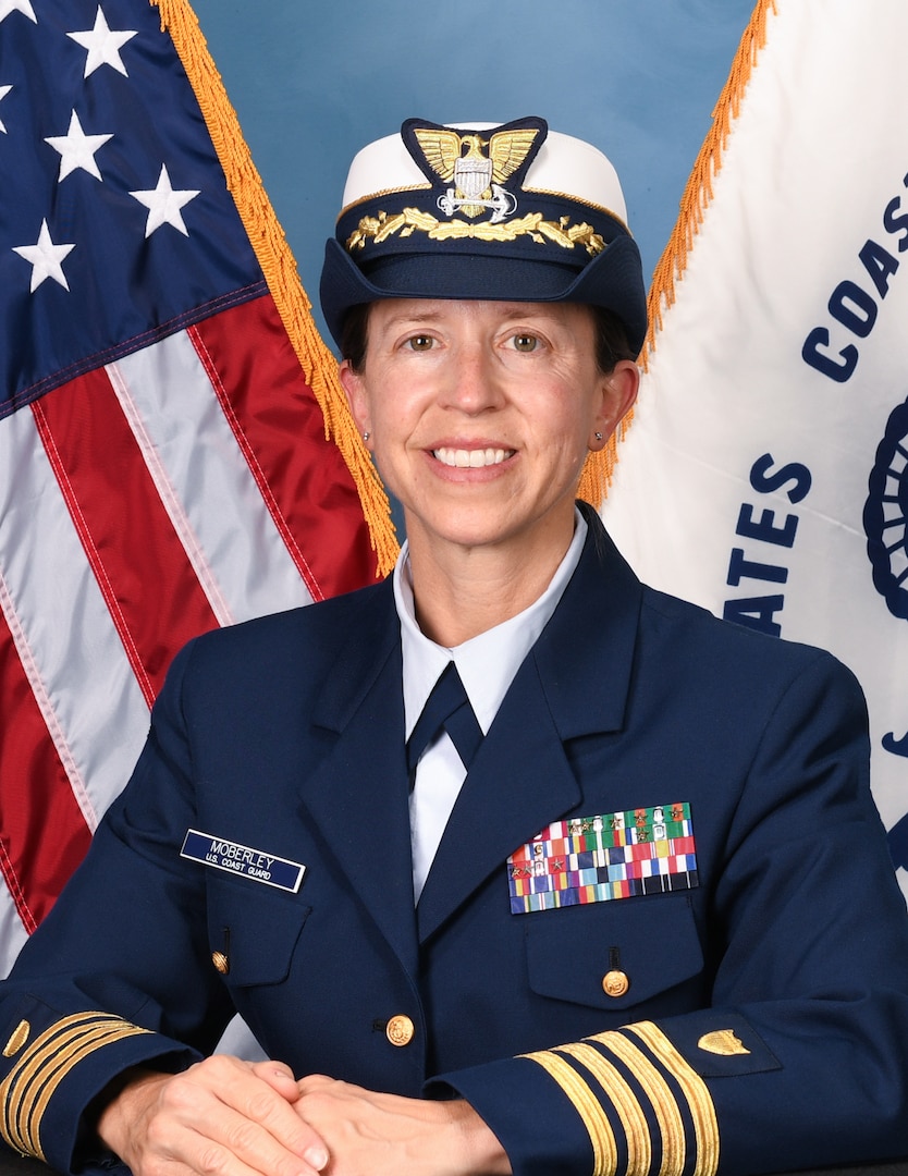 U.S. Coast Guard Capt. Carolyn Moberley, pictured, relieved Capt. Tedd Hutley as commander of the Coast Guard National Strike Force and commanding officer of the National Strike Force Coordination Center during a change of command ceremony, June 15, 2023, at the Coast Guard Base Elizabeth City. (U.S. Coast Guard photo courtesy of the National Strike Force Coordination Center)