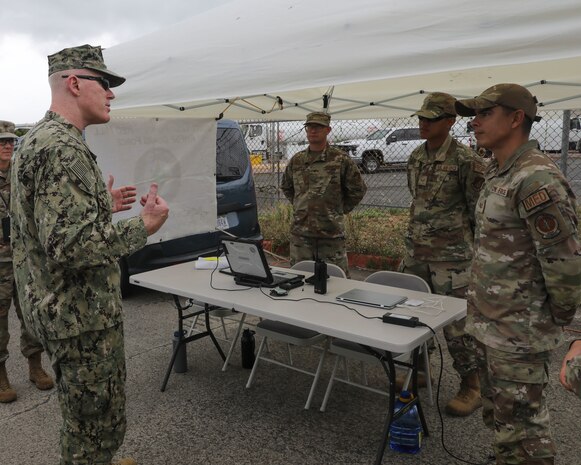 Joint Task Force-Red Hill (JTF-RH) Commander, U.S. Navy Vice Adm. John Wade addresses service members assigned as entry control point sentries at the Red Hill Bulk Fuel Storage Facility (RHBFSF) June 13, 2023.