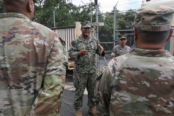 Joint Task Force-Red Hill (JTF-RH) senior enlisted leader, U.S. Navy Command Master Chief Leonard Anderson addresses service members assigned as entry control point sentries at the Red Hill Bulk Fuel Storage Facility (RHBFSF) June 13, 2023.