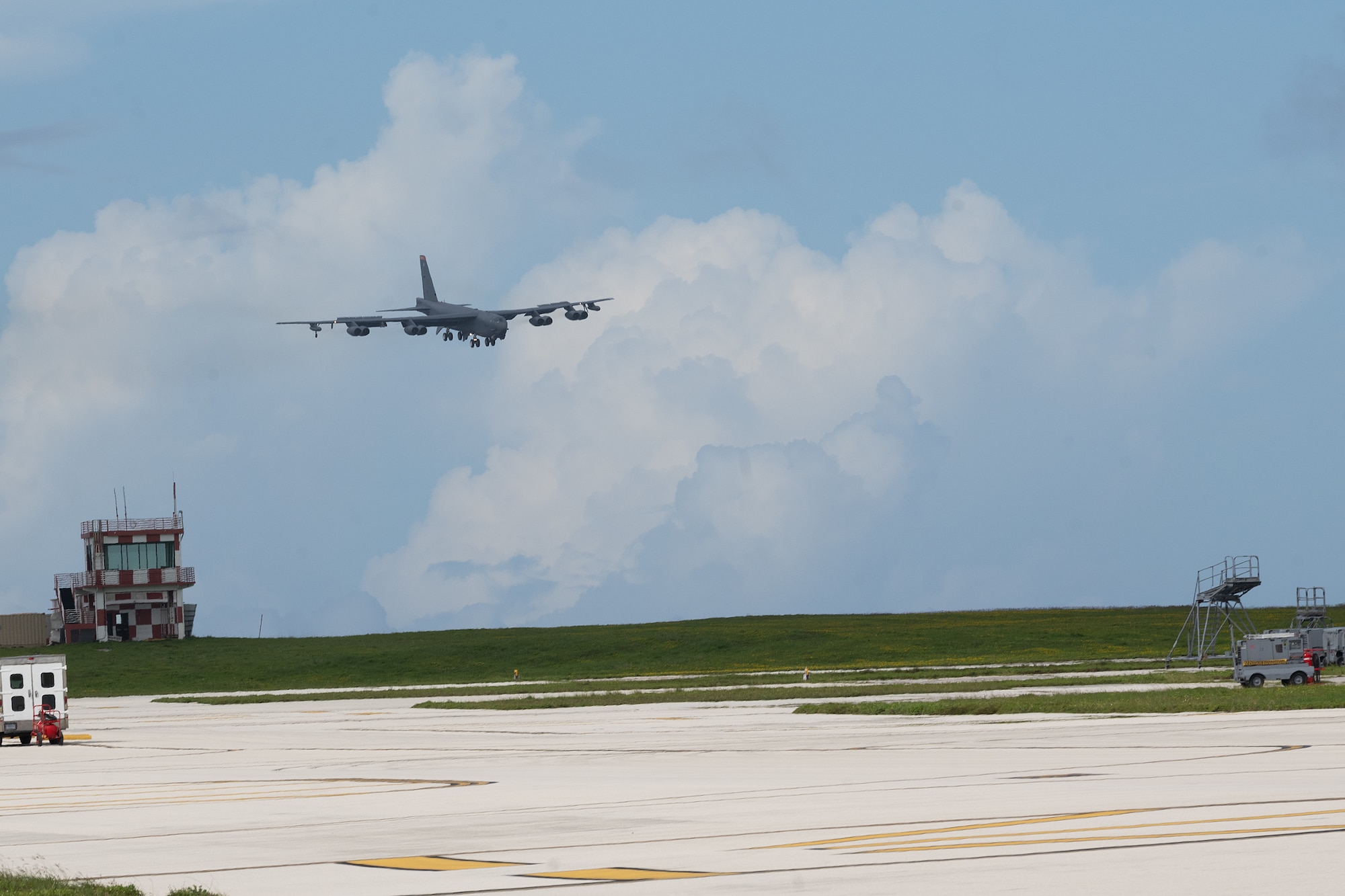 A U.S. Air Force B-52H Stratofortress assigned to the 23rd Bomb Squadron at Minot Air Force Base, North Dakota, prepares to land on the flightline at Andersen Air Force Base, Guam, for a Bomber Task Force deployment, June 12, 2023. U.S. Strategic Command BTF missions help maintain global stability and security by demonstrating the ability to operate in different environments and locations while building ally and partner military capabilities. (U.S. Air Force photo by Tech. Sgt. Zade Vadnais)