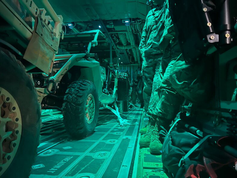 all terrain vehicles sit inside an aircraft