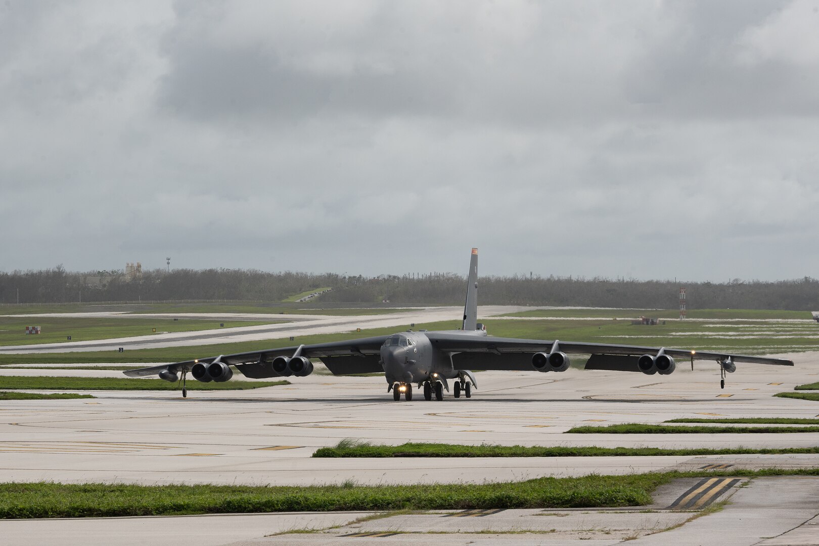 A U.S. Air Force B-52H Stratofortress assigned to the 23rd Bomb Squadron at Minot Air Force Base, North Dakota, taxis on the runway upon landing at Andersen Air Force Base, Guam, for a Bomber Task Force deployment, June 12, 2023. Strategic bomber missions like this enhance the readiness and training necessary to respond to any potential crisis or challenge across the globe. (U.S. Air Force photo by Tech. Sgt. Zade Vadnais)