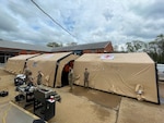 overview of three tents set up