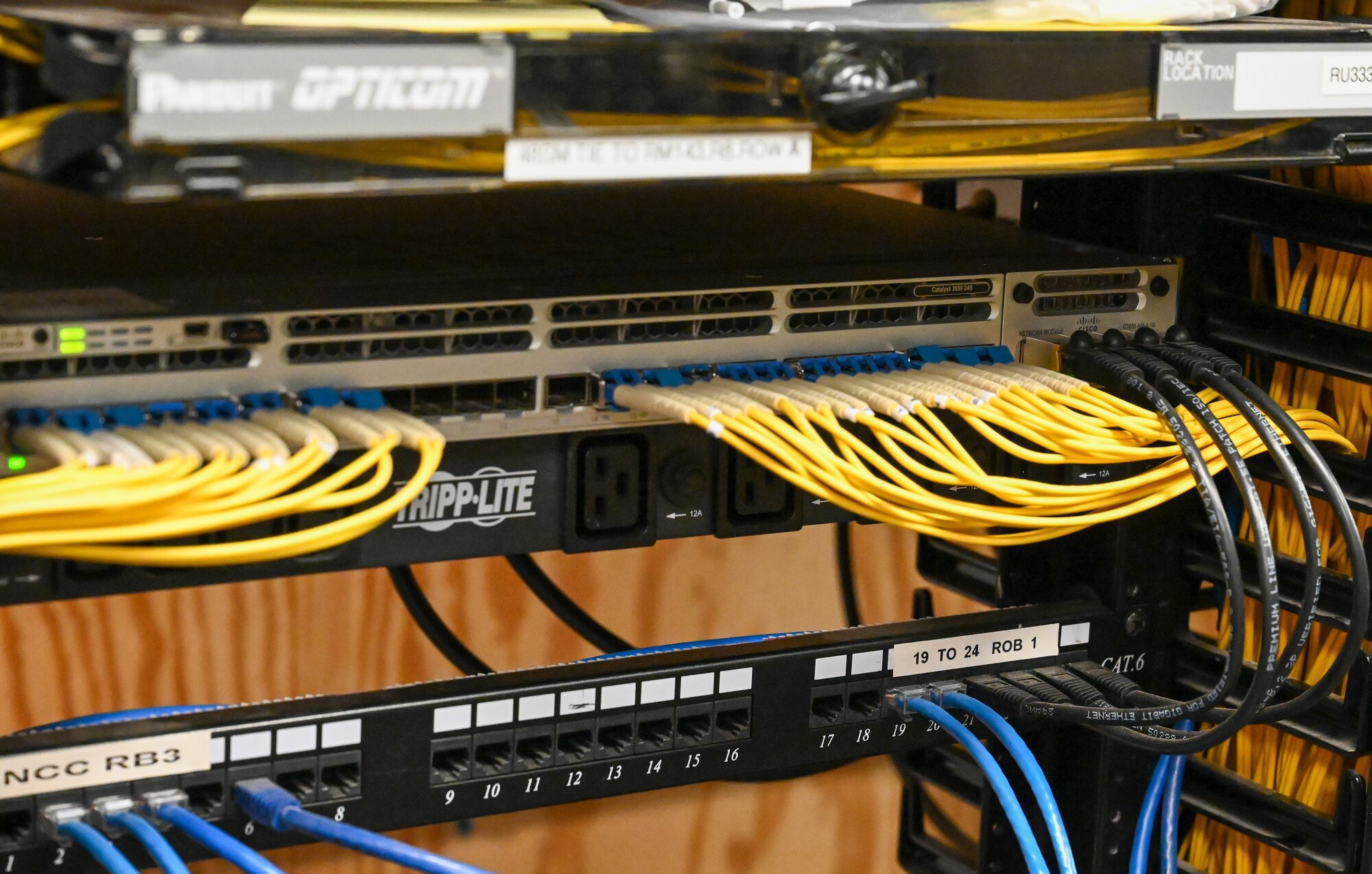 Cisco WS-385024-S Switch catalyst with multiple wired connections sits in the 97th Communications Squadron (CS) at Altus Air Force Base, Oklahoma, June 12, 2023. The equipment is used for secure networking. (U.S. Air Force photo by Airman 1st Class Heidi Bucins)