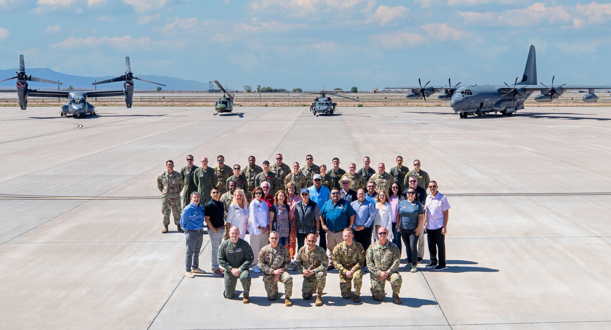 A group poses for a photo.