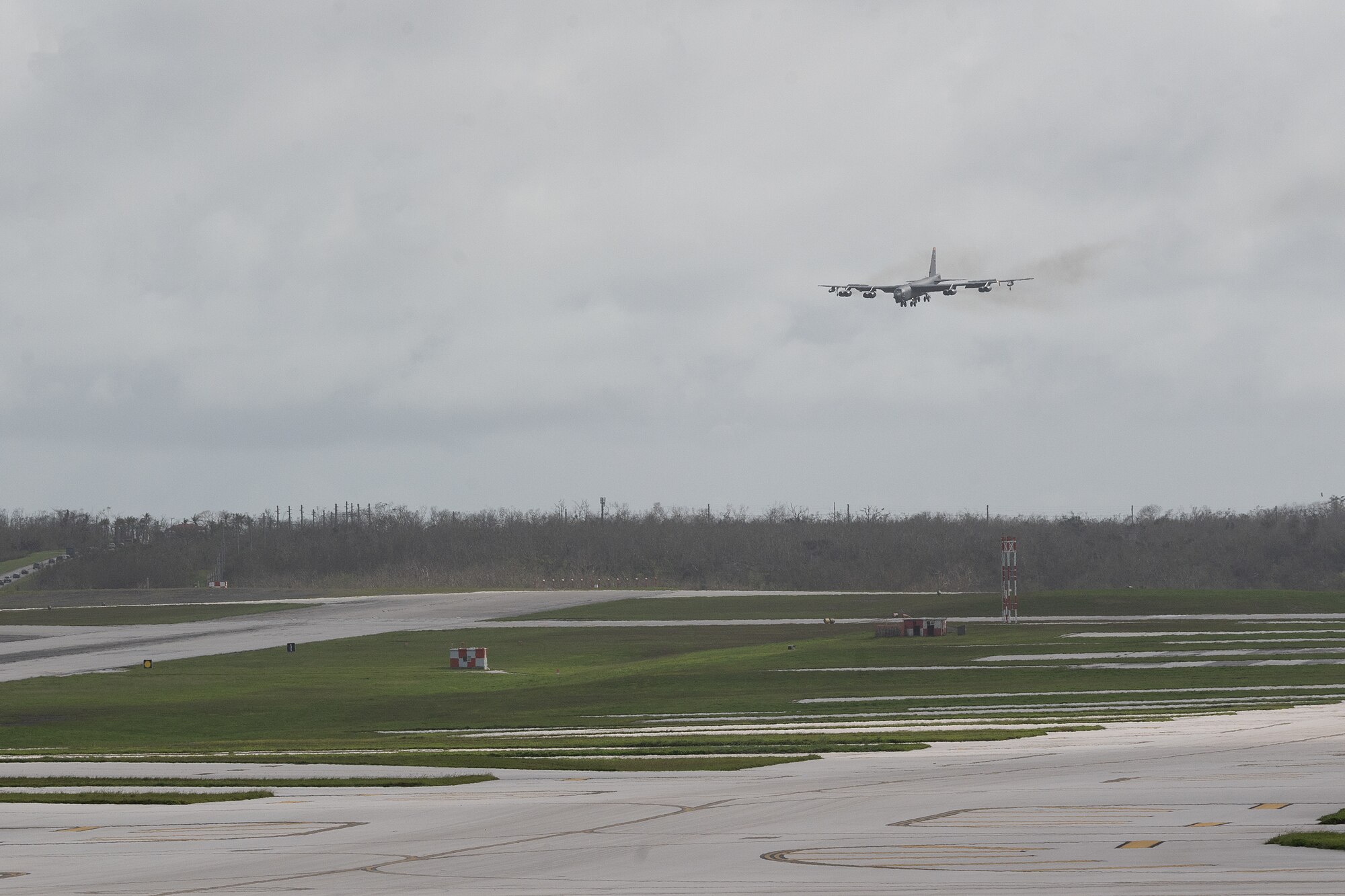 A U.S. Air Force B-52H Stratofortress assigned to the 23rd Bomb Squadron at Minot Air Force Base, North Dakota, prepares to land on the flightline at Andersen Air Force Base, Guam, for a Bomber Task Force deployment, June 12, 2023. U.S. Strategic Command BTF missions help maintain global stability and security by demonstrating the ability to operate in different environments and locations while building ally and partner military capabilities. (U.S. Air Force photo by Tech. Sgt. Zade Vadnais)