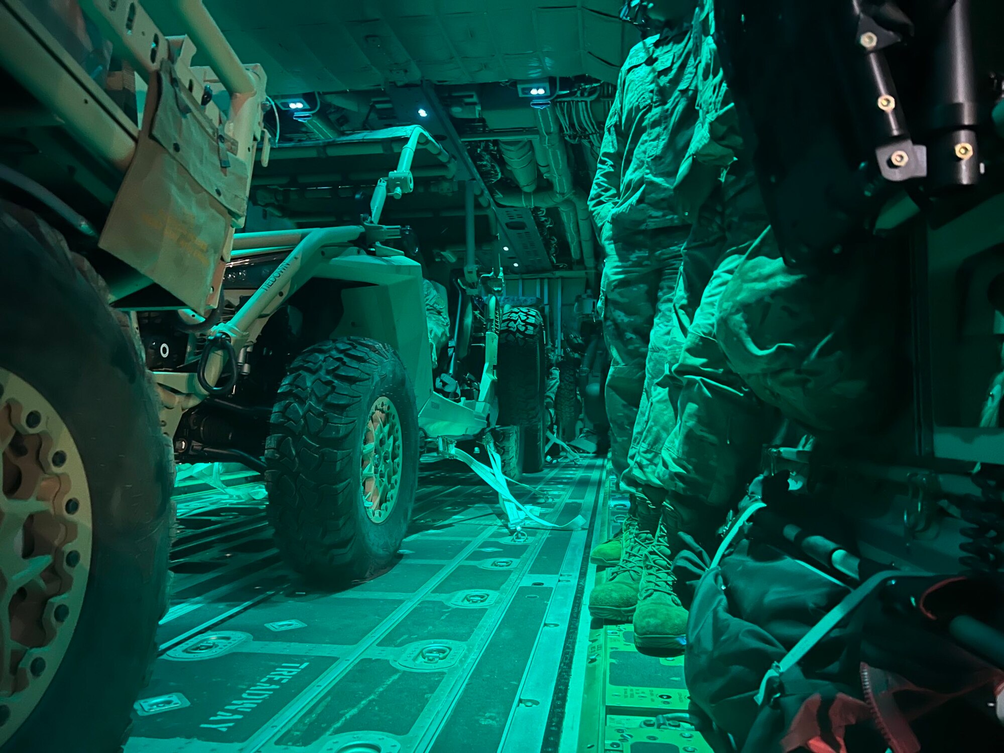 all terrain vehicles sit inside an aircraft