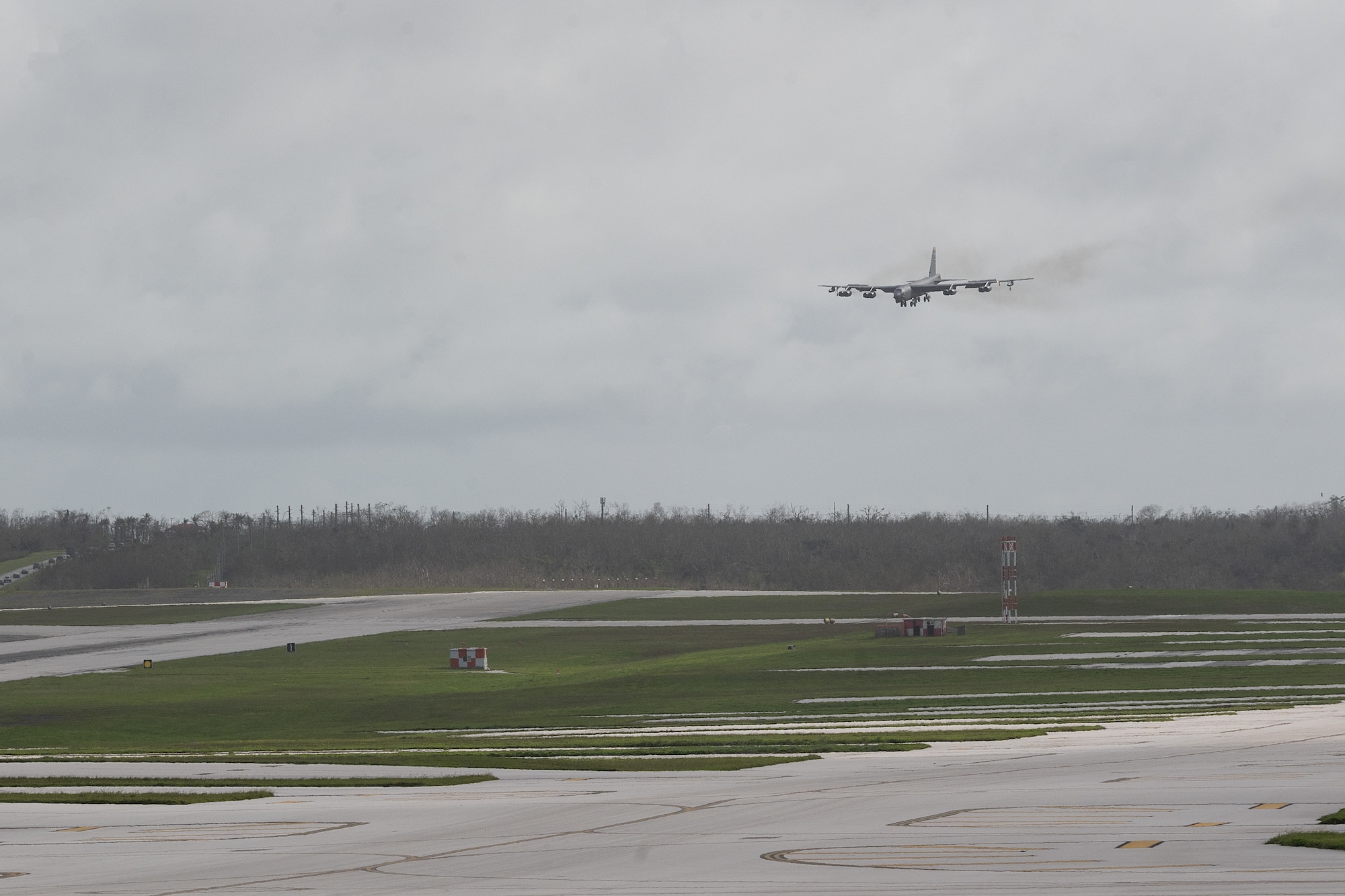 A U.S. Air Force B-52H Stratofortress assigned to the 23rd Bomb Squadron at Minot Air Force Base, North Dakota, prepares to land on the flightline at Andersen Air Force Base, Guam, for a Bomber Task Force deployment, June 12, 2023. U.S. Strategic Command BTF missions help maintain global stability and security by demonstrating the ability to operate in different environments and locations while building ally and partner military capabilities. (U.S. Air Force photo by Tech. Sgt. Zade Vadnais)