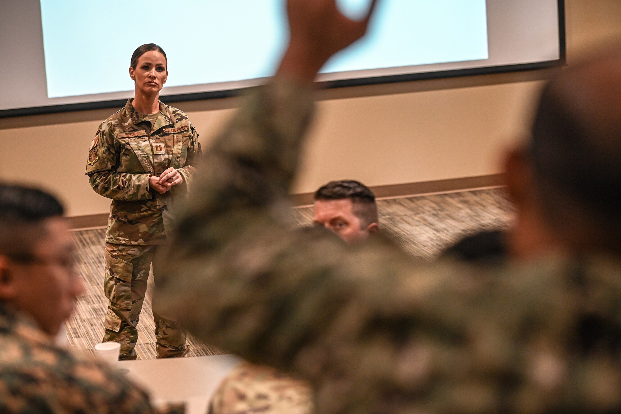 U.S. Air Force Capt. Sara Hecht, an assistant officer in charge assigned to the 131st Bomb Wing at Jefferson Barracks Air National Guard Base, Missouri, answers questions during an Innovative Readiness Training Program at Poplar Bluff, Missouri, June 10, 2023. The DOD sponsored program is designed to build relationships with local communities by providing key medical and dental services while simultaneously providing real-world training experience. (U.S. Air National Guard photo by Airman 1st Class Danielle Dawson)