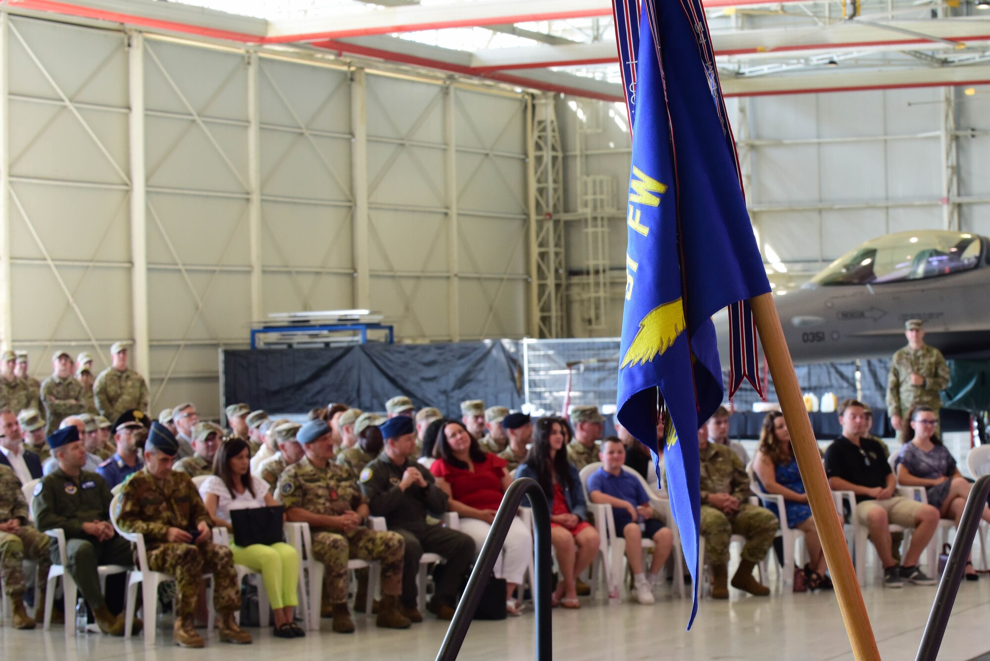 A 31st Maintenance Group guidon flag hangs during the 31st MXG change of command ceremony at Aviano Air Base, Italy, June 15, 2023. The mission of the 31st Maintenance Group is to provide peacetime and combat maintenance and munitions control, and executive support for the 31st Fighter Wing, geographically separated units under the command and control of the wing, and units gained during advanced stages of readiness. (U.S. Air Force photo by Airman Zachary Jakel)
