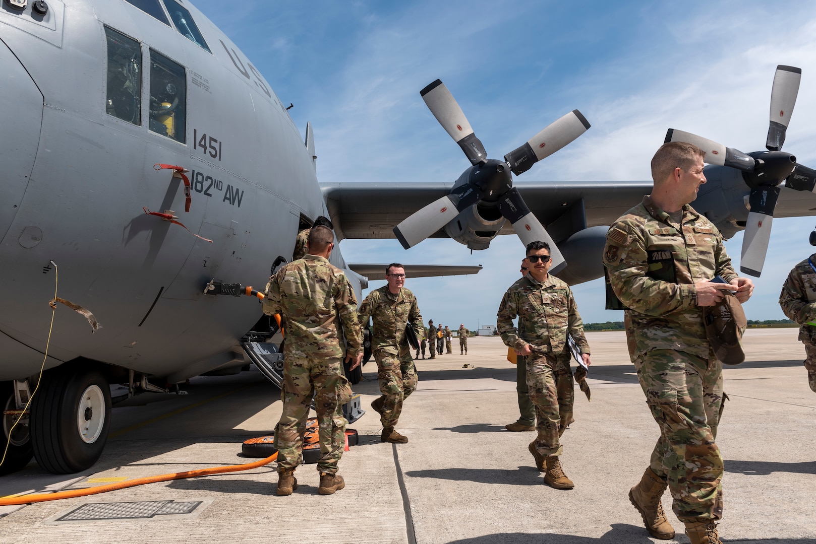 U.S. Airmen with the 182nd Airlift Wing, Illinois National Guard, deplane a C-130 Hercules aircraft to prepare for exercise Air Defender 2023 at Wunstorf Air Base, Wunstorf, Germany, May 31, 2023. Exercise AD23 integrates U.S. and Allied air power to defend shared values, while leveraging and strengthening vital partnerships to deter aggression around the world.