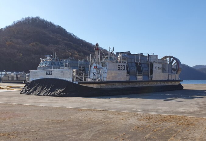 The Landing Ship Fast II (LSF-II) craft 633 is shown before the inflation of the skirting. This December 2022 operation tested the Command, Control, Communication, Computers, and Navigation (C4N) system for operating the engine and running the lift fans used to inflate the bags in the skirting, and the propellers and air ducts used to maneuver the craft on the tarmac. This is the first time the C4N operated as a system and actively controlled functions aboard the vessel. (courtesy photo provided by Hanjin Shipbuilding and Construction with permission from the Republic of Korea Defense Acquisition Program Administration)