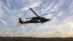 An HH-60W Jolly Green II lands at Grand Bay Bombing and Gunnery Range during a deployment readiness exercise at Moody Air Force Base, Georgia, Feb. 23.