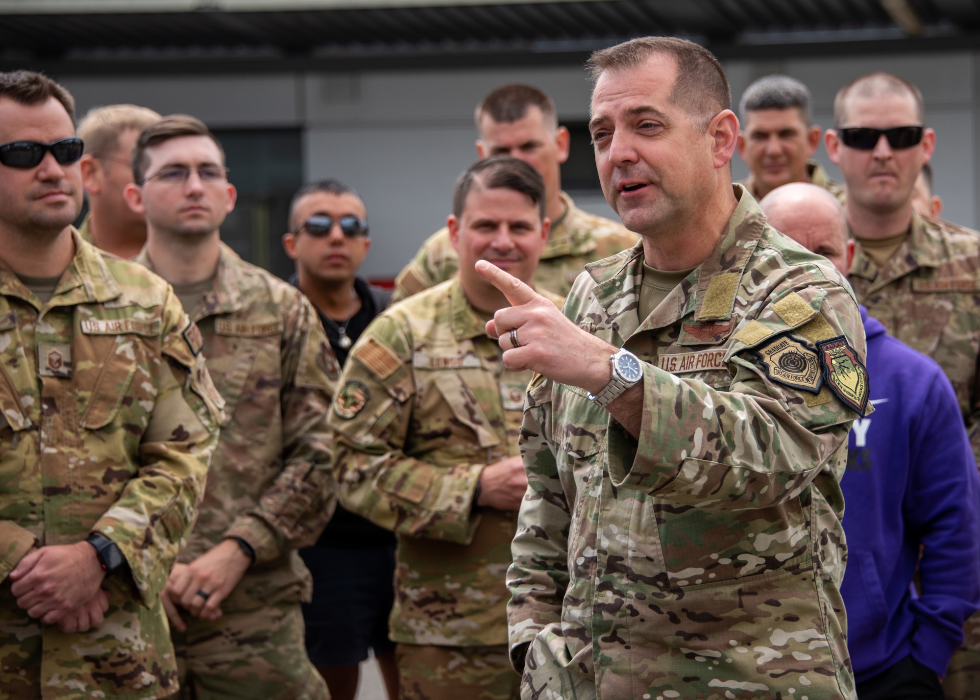 U.S. Air Force Col. Bryan T. Callahan, 406th Air Ground Operations Wing and 406th Air Expeditionary Wing commander, welcomes incoming deployers to the 406th AEW before they embark to their respective deployed locations within the African continent at Ramstein Air Base, Germany, May 18th, 2023.