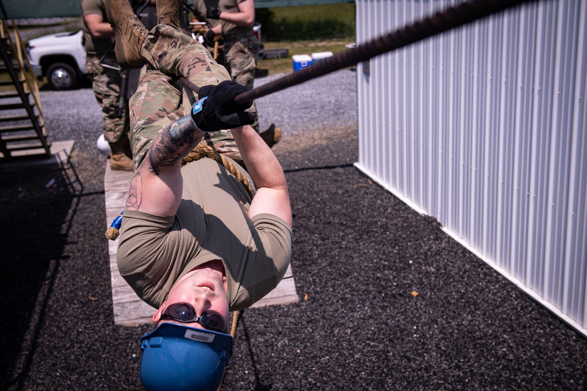 Airmen from the 271st Combat Communications Squadron participate in the leadership reaction course at Fort Indiantown Gap, Pennsylvania, May 21, 2023.