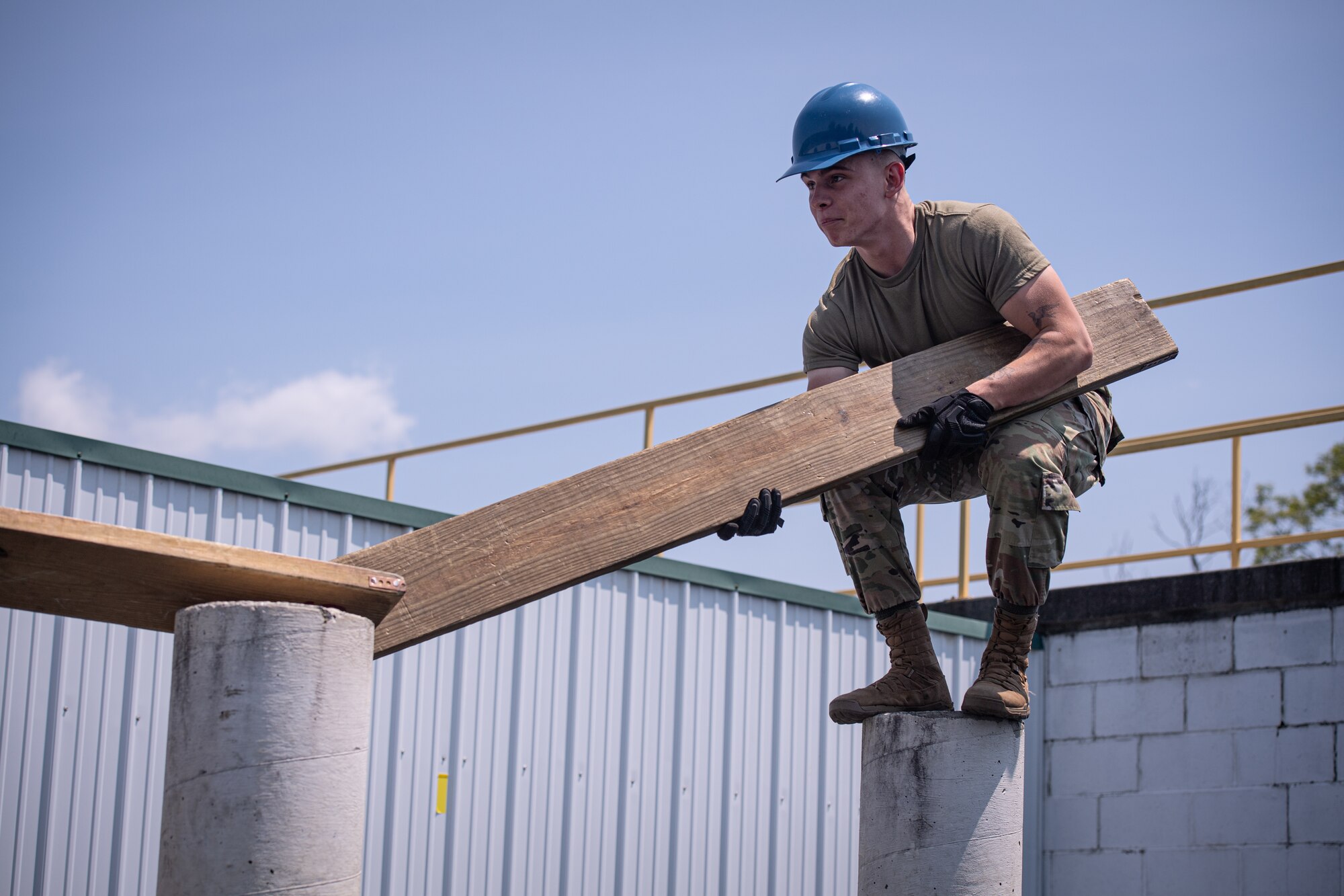 Airmen from the 271st Combat Communications Squadron participate in the leadership reaction course at Fort Indiantown Gap, Pennsylvania, May 21, 2023.