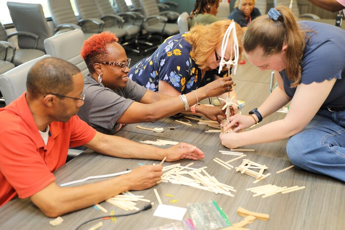 The teams had 20 minutes to complete their tower with popsicle sticks, pipe cleaners and scotch tape.