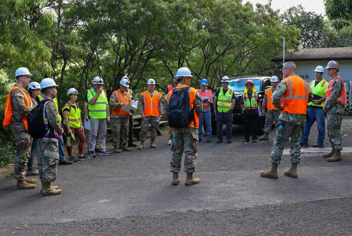 Joint Task Force-Red Hill (JTF-RH) Repair Directorate Project Manager, U.S. Army Maj. Seung Yoo, addresses regulators from the Hawaii Department of Health and Environmental Protection Agency during the observation of the repairs conducted at the Red Hill Bulk Fuel Storage Facility (RHBFSF) in Halawa, Hawaii, Jun. 12, 2023.