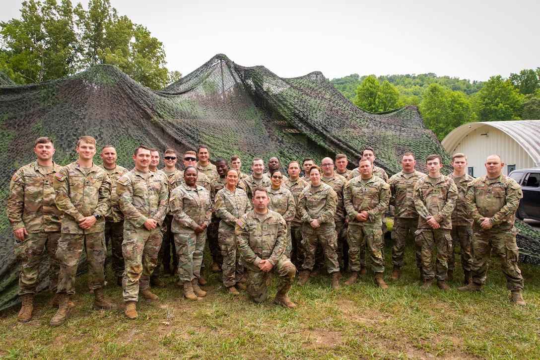 Soldiers of India Company, 429th Brigade Support Battalion, 75th Troop Command, pose for a photo during the Regional Philip A. Connelly Field Feeding Competition at the Harlold L. Disney Training Center in Artemus, Kentucky on June 14, 2023. The Soldiers are competing against nine other states and territories National Guard field feeding units in the southeast United States for a chance to compete nationally against the other regions of the National Guard. (U.S. Army National Guard photo by Andy Dickson)