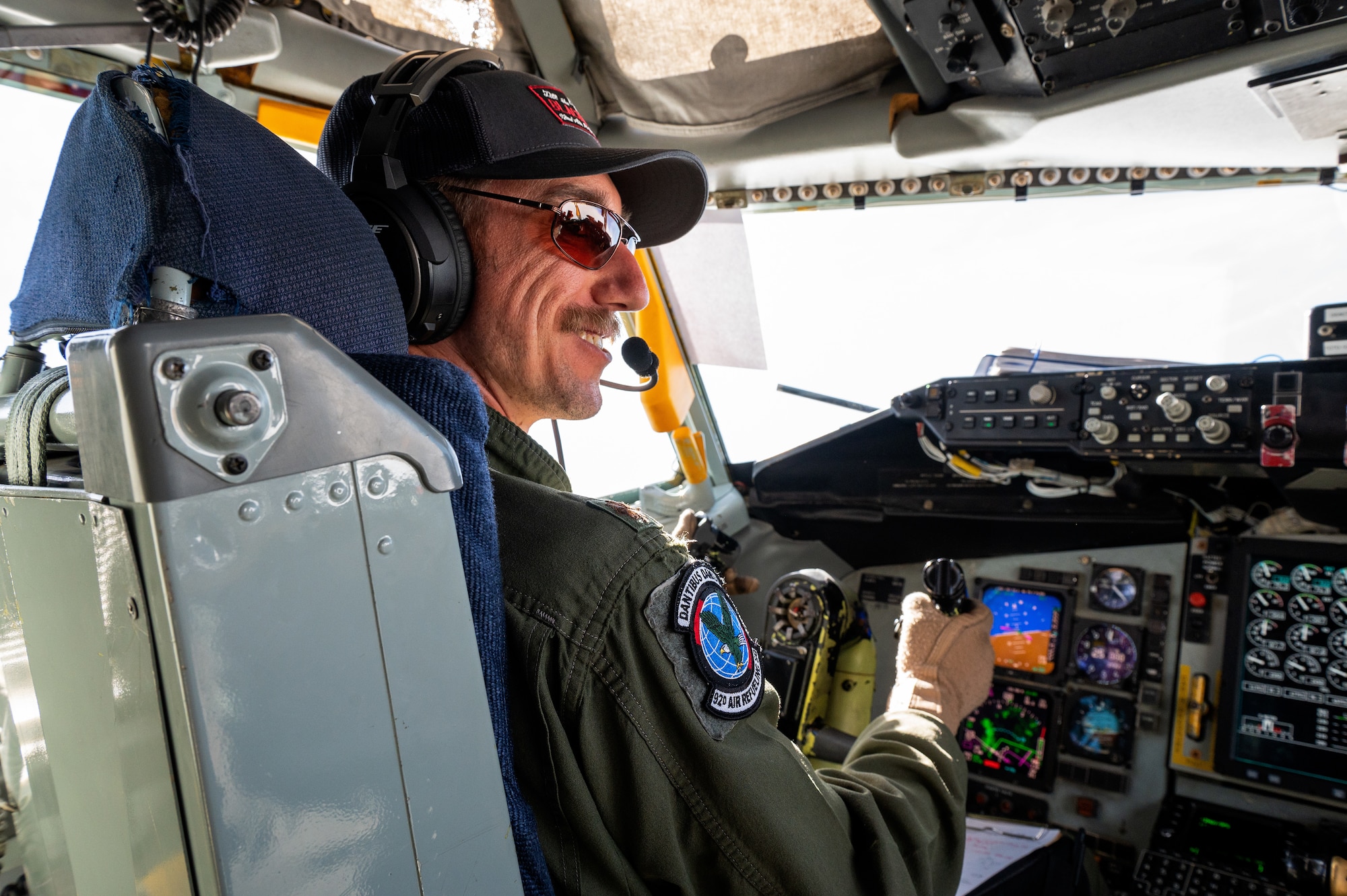 U.S. Air Force Maj. Nate (MOCA) Mocalis, 92nd Air Refueling Squadron pilot, flies a KC-135 Stratotanker assigned to Fairchild Air Force Base over Alaska, during a Phase 3 Lead Wing exercise, June 6th, 2023. Mocalis and his crew rested on the KC-135 overnight before flying a 16-hour duty period with safety observers and a flight-certified physician.