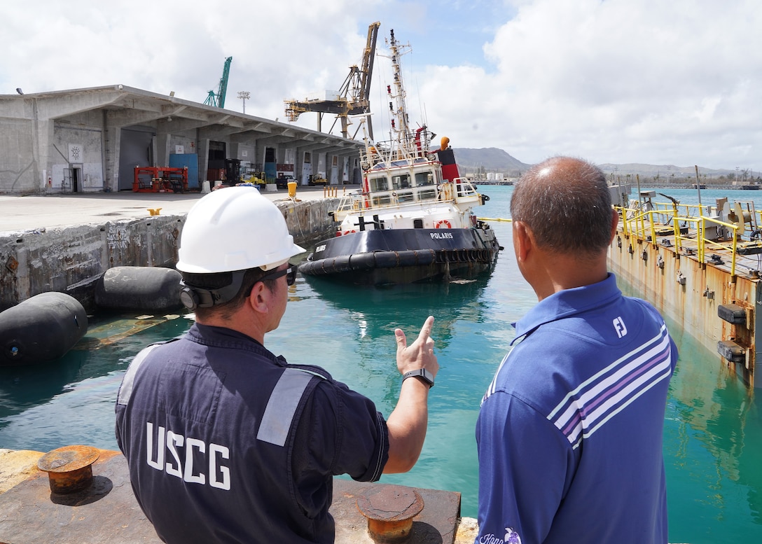 Chief Petty Officer Roderick Bawar, a Marine Science Technician stationed at U.S. Coast Guard Forces Micronesia / Sector Guam, conducts port assessments in Guam May 29, 2023, following Typhoon Mawar.