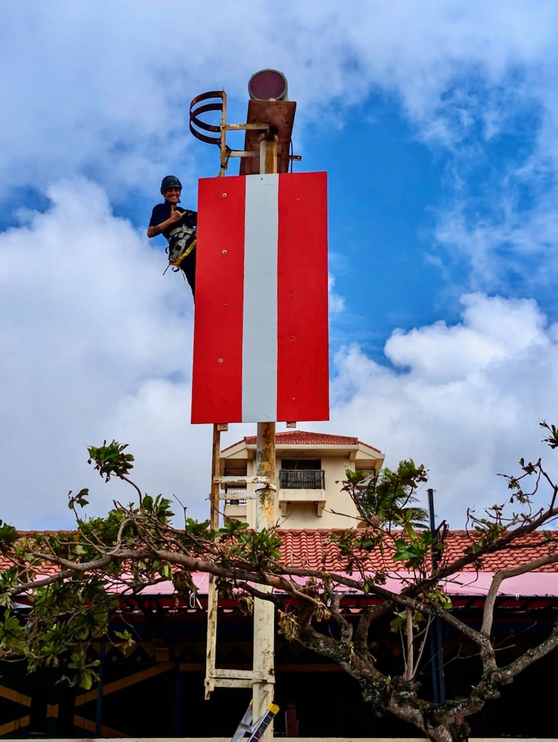 The crew of USCGC Sequoia (WLB 215) restores the rear range at Agana Boat Basin in Guam on May 29, 2023.