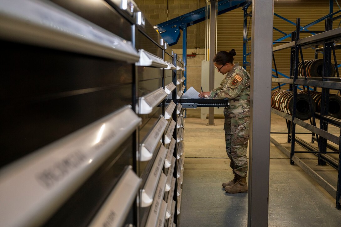 U.S. Air Force Staff Sgt. O'Shea Stankus, 49th Logistics Readiness Squadron aircraft parts store supervisor, looks for an aircraft part at Holloman Air Force Base, New Mexico, June 14, 2023.
