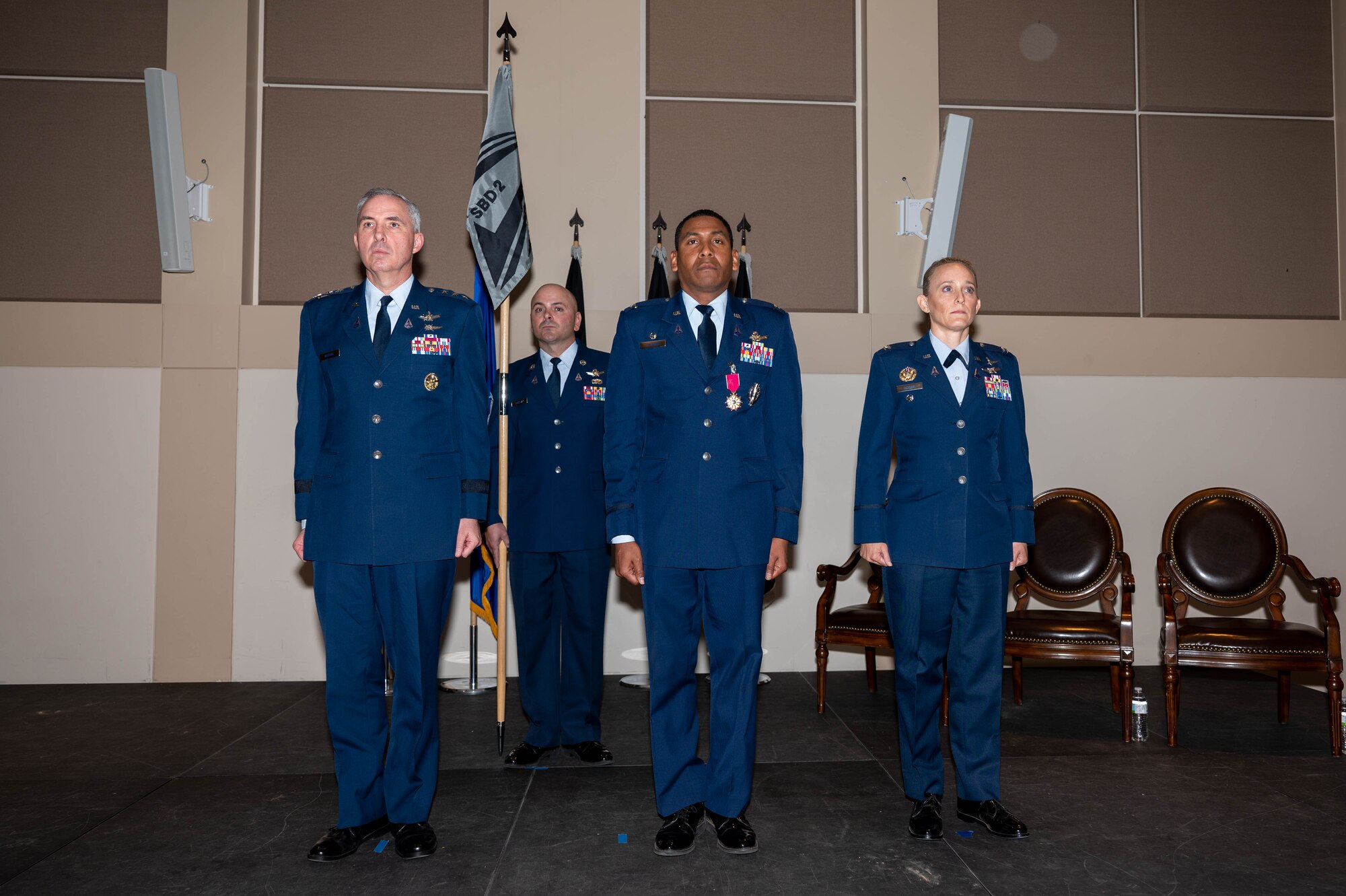 Leaders standing on stage