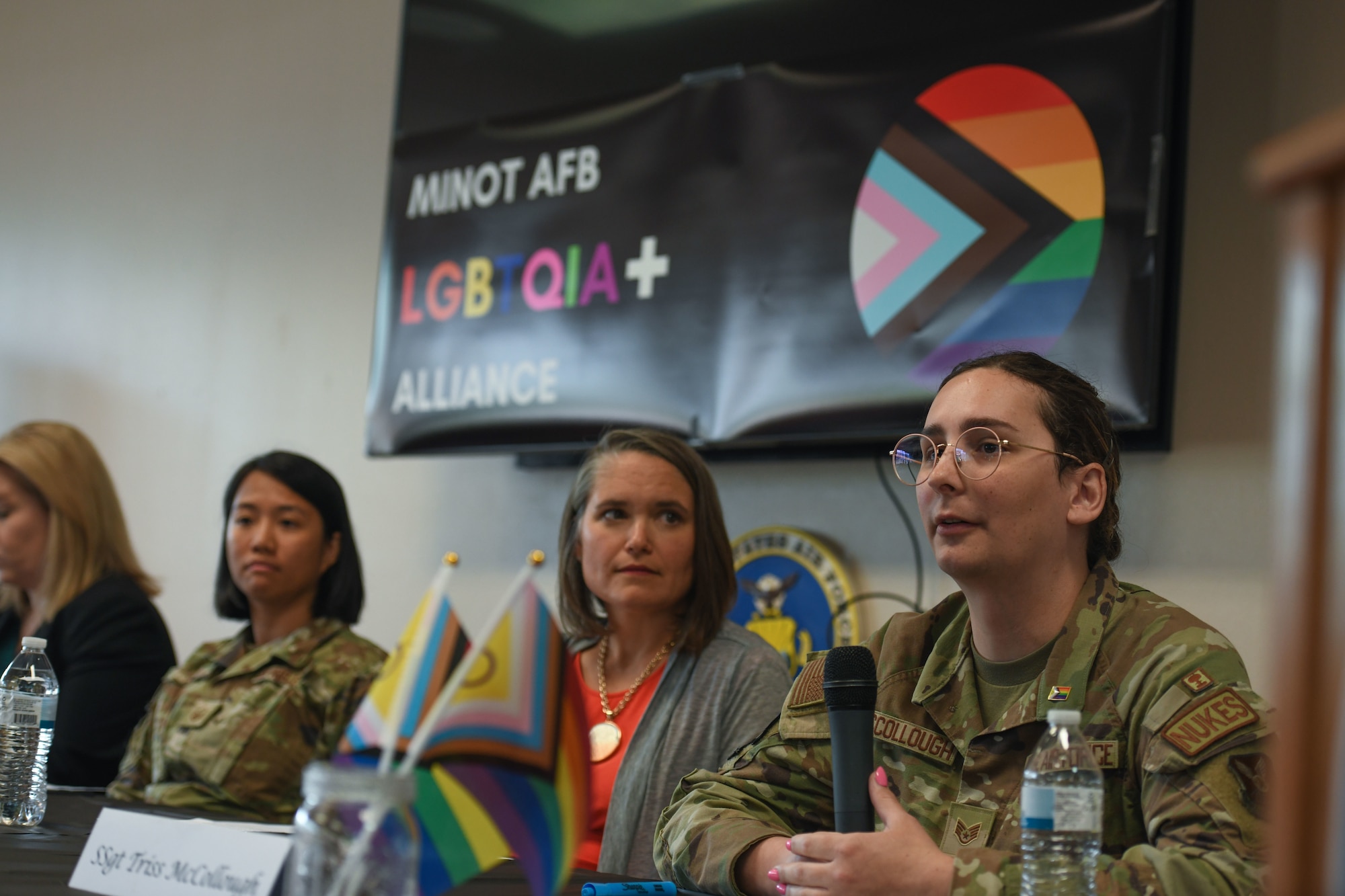Team Minot Airmen participate in a 2023 Pride Month panel at Minot Air Force Base, North Dakota, June 14, 2023. Members of Team Minot speak during a 2023 Pride Month Panel at Minot Air Force Base, North Dakota, June 14, 2023. During the event members of the panel shared their experiences and the impact of the LGBTQI+ community. (U.S. Air Force Photo by Airman 1st Class Trust Tate)