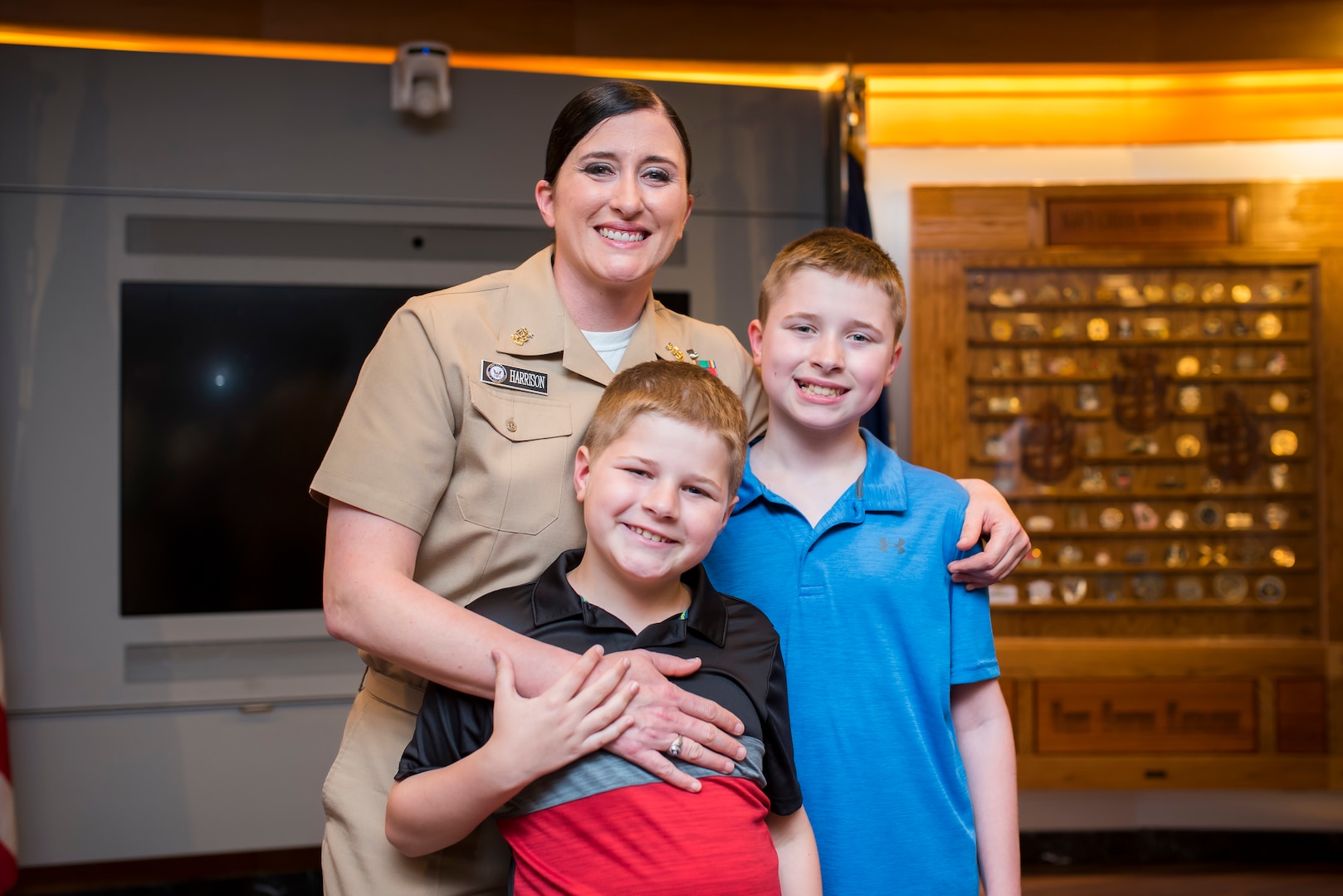 PHOTO OF GMCM JESSICA HARRISON POSING WITH TWO SONS