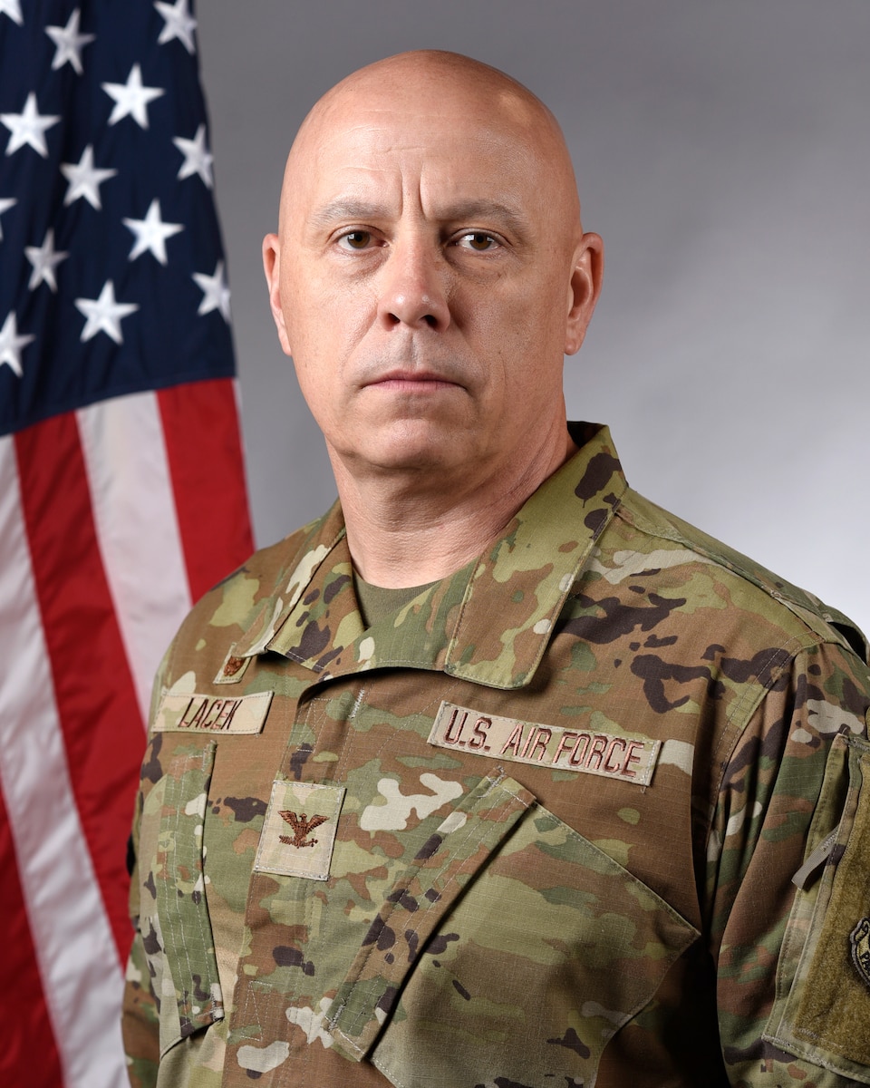 Colonel Christopher Lacek,poses for an official portrait at Kunsan Air Base