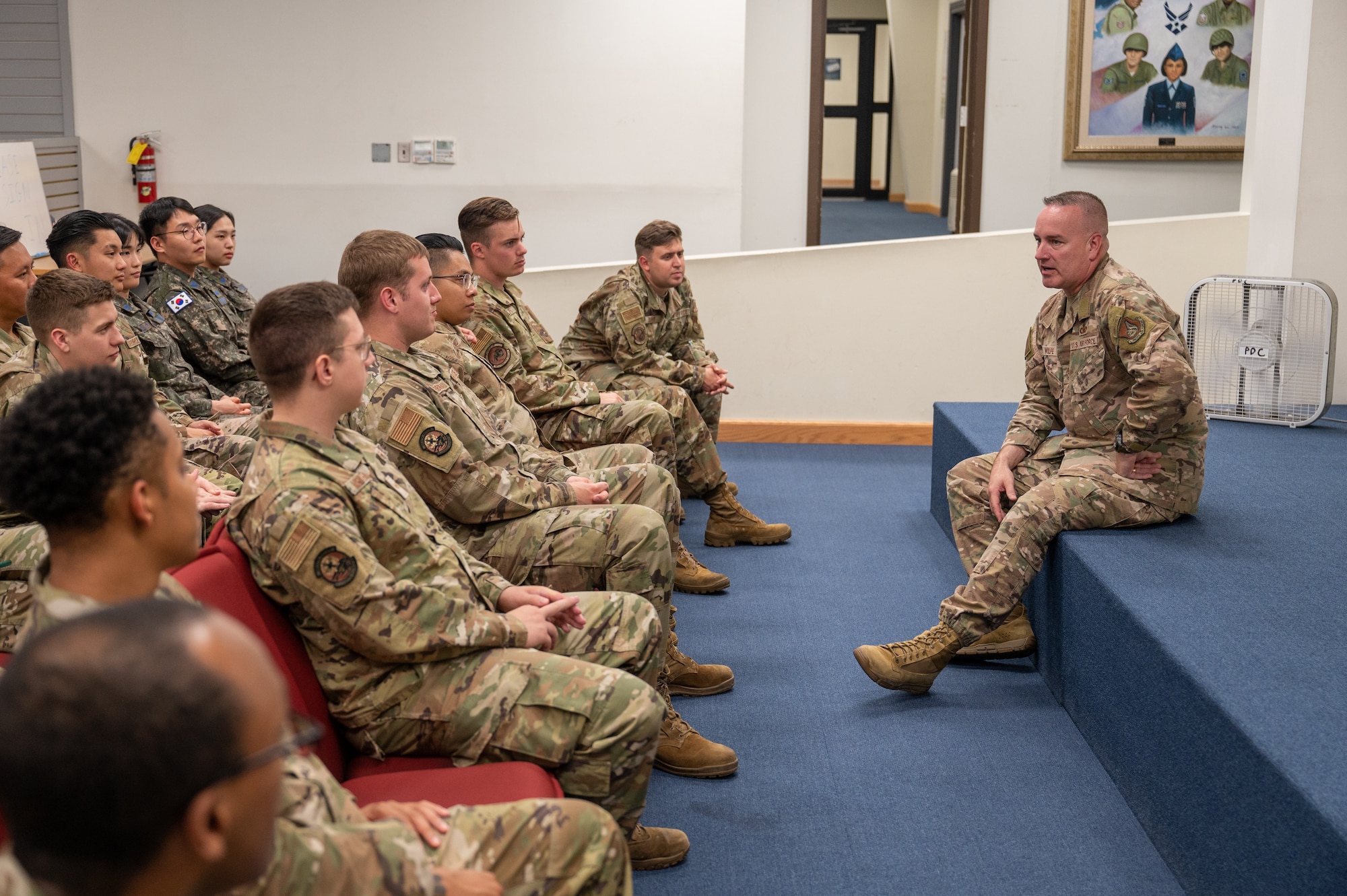 Chief Master Sgt. David Wolfe speaks to U.S and Republic of Korea Airmen attending Airman Leadership School at Kunsan Air Base