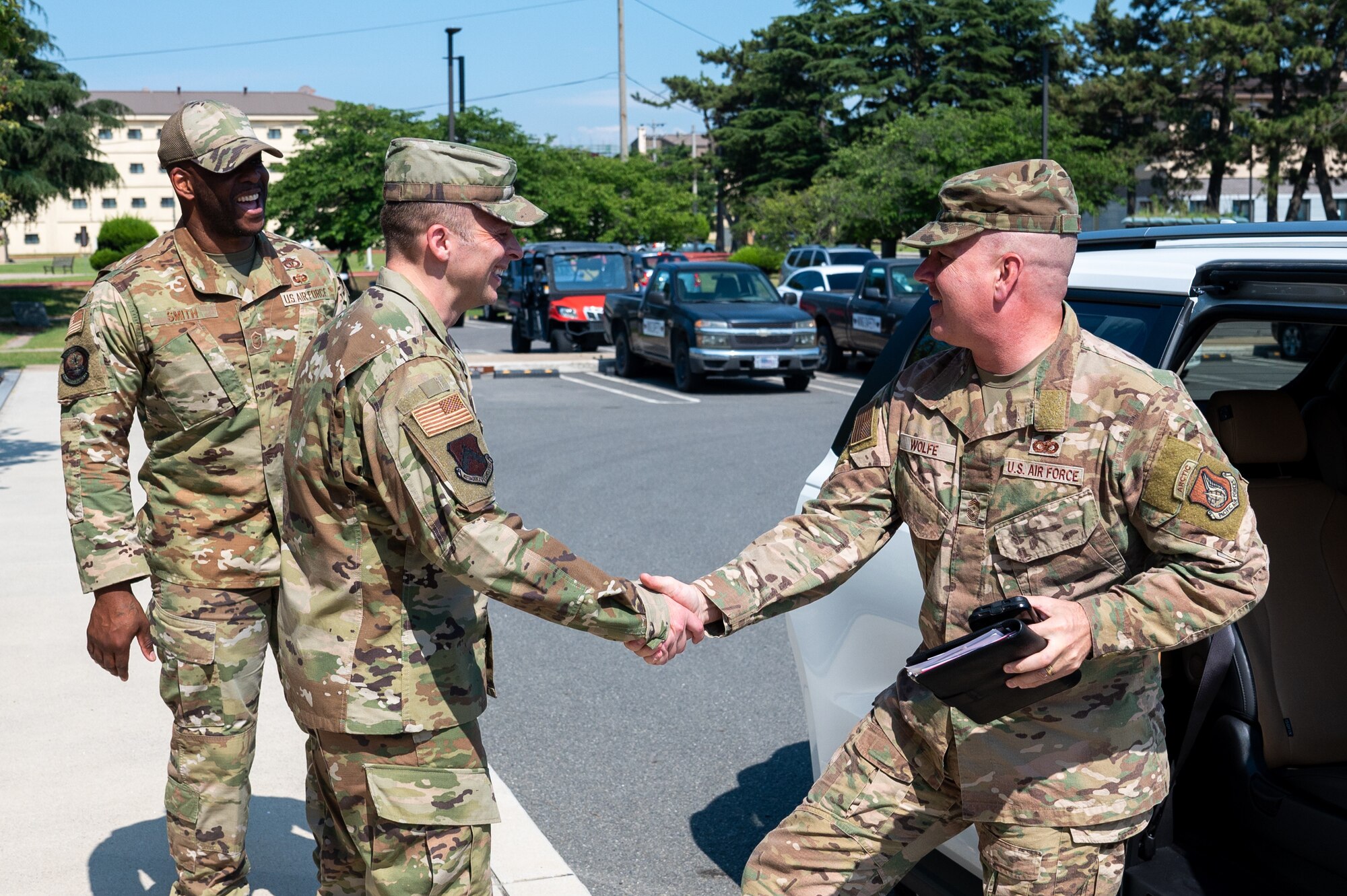 Chief Master Sgt. Steven G. Creek shakes hands with Chief Master Sgt. David Wolfe during his visit to Kunsan Air Base