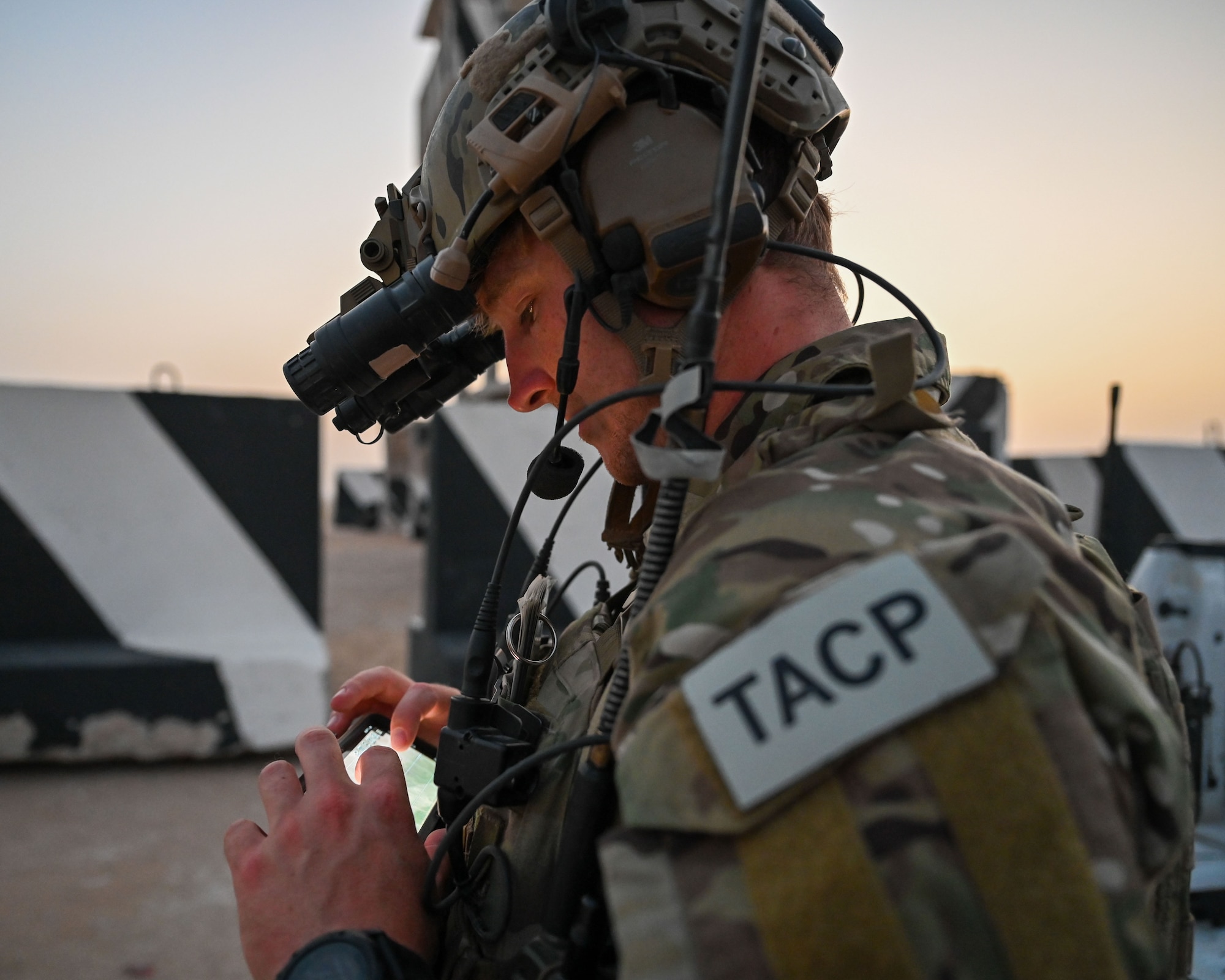 Tactical Air Control Party (TACP) Airmen from the 82nd Expeditionary Air Support Operations Squadron prepare for a large-scale exercise at Udairi Range, Kuwait, June 13, 2023. The exercise included U.S. Air Force fixed wing close air support aircraft, U.S. Army Apache helicopters, and Army mortars from a light infantry company. TACP Airmen are leading the way in representing the multi-capable airman concept as they are experts in multi-domain, joint operations, command and control, close air support, and surface to surface fires.