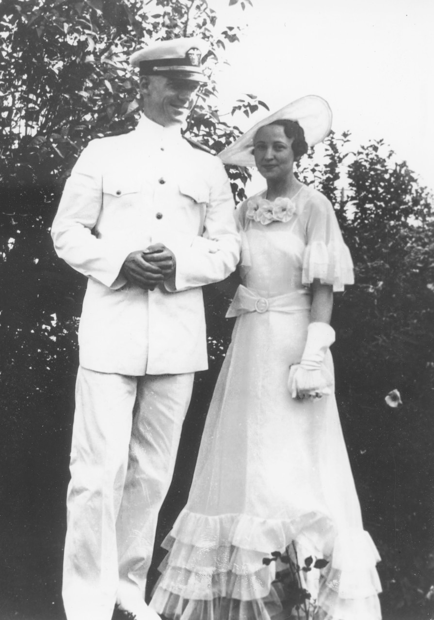 Hometown sweethearts -Midshipman Frederick Schrader escorts Lucille Coleman during June Week festivities at the United States Naval Academy. When the couple became betrothed, a replica of his class ring would serve as her engagement ring.
