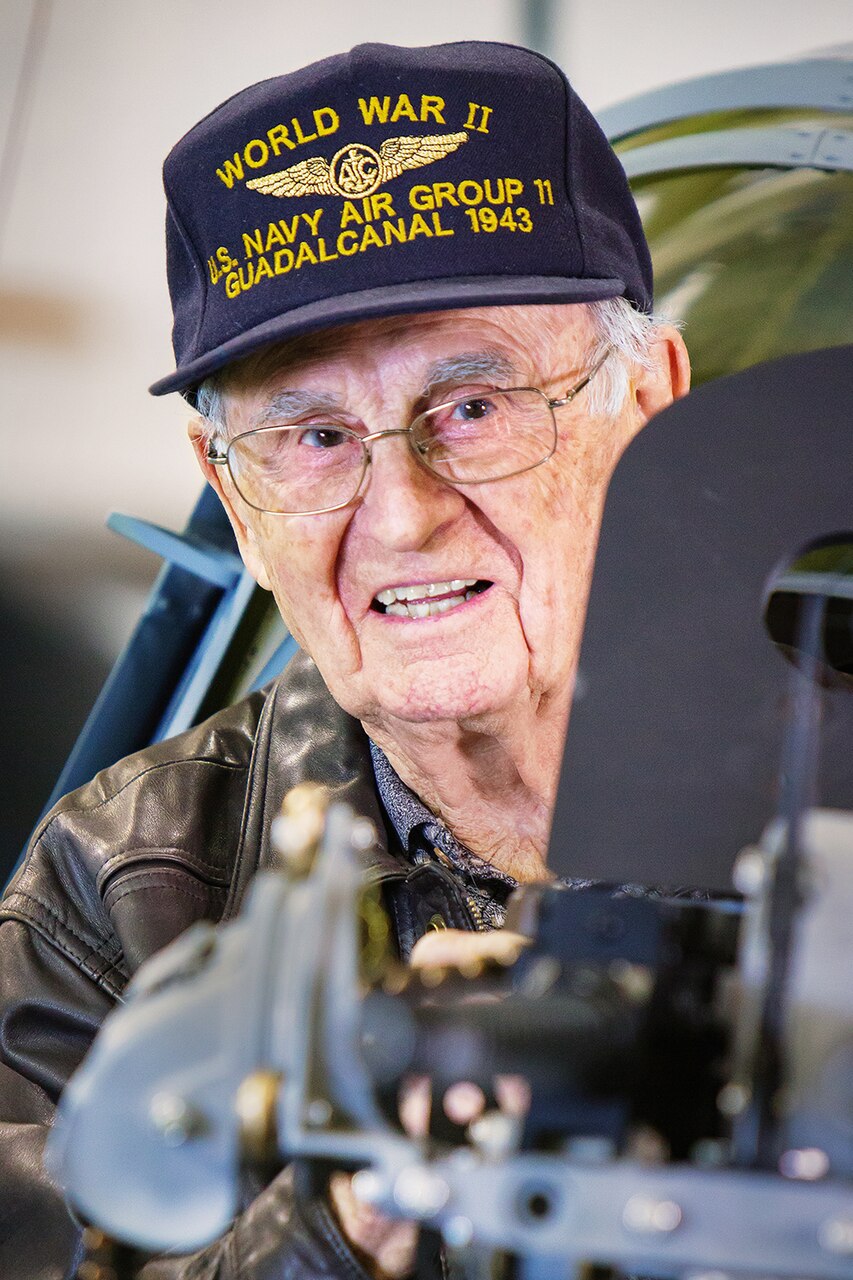 Radioman 2nd Class Richard Miralles, the lone survivor of Cmdr. Frederick Schrader’s CVG 11 aboard USS Hornet (CV 12), sits in an SBD Dauntless.