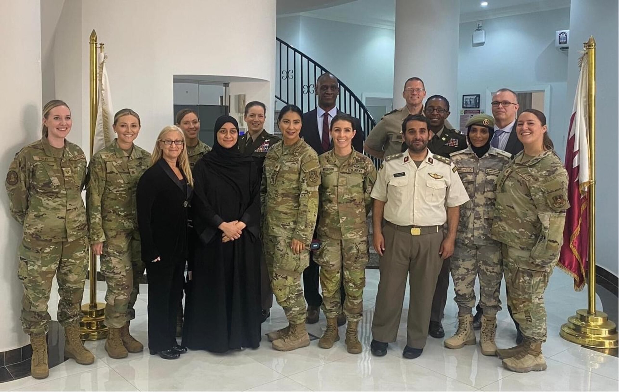 West Virginia National Guardsmen Tech. Sgt. Victoria Bagley, Maj. Taylar Belfield, left, and 1st Lt. Abbey Welborn fourth from right, participated in the Women in Strategic Intelligence Seminar  at the Directorate of Military Intelligence in Doha, Qatar, May 14-18