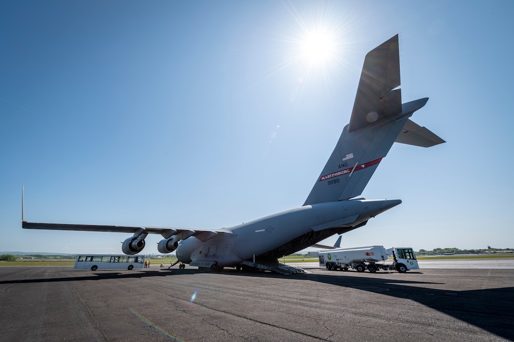 A C-17 Globemaster III aircraft with the 167th Airlift Wing, West Virginia National Guard receives maintenance and refueling on the flight line at Glasgow Prestwick Airport, Scotland, May 30, 2023, after transporting cargo and personnel as part of exercise Air Defender 2023
